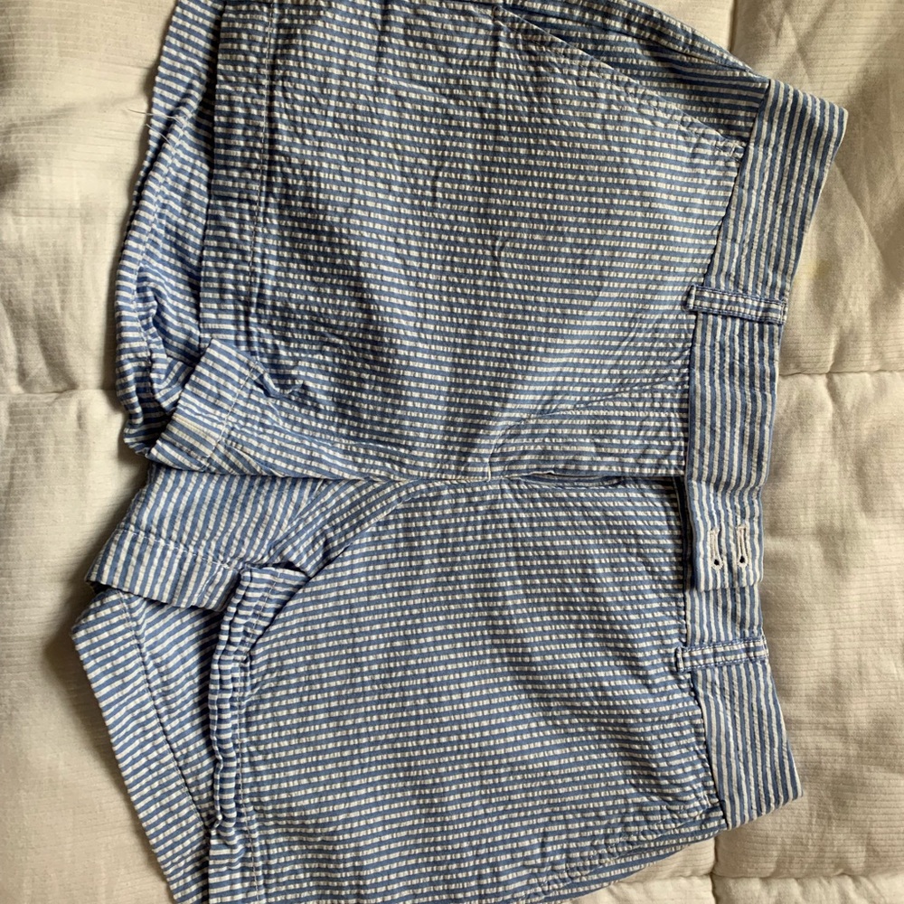 Blue shorts with white stripes